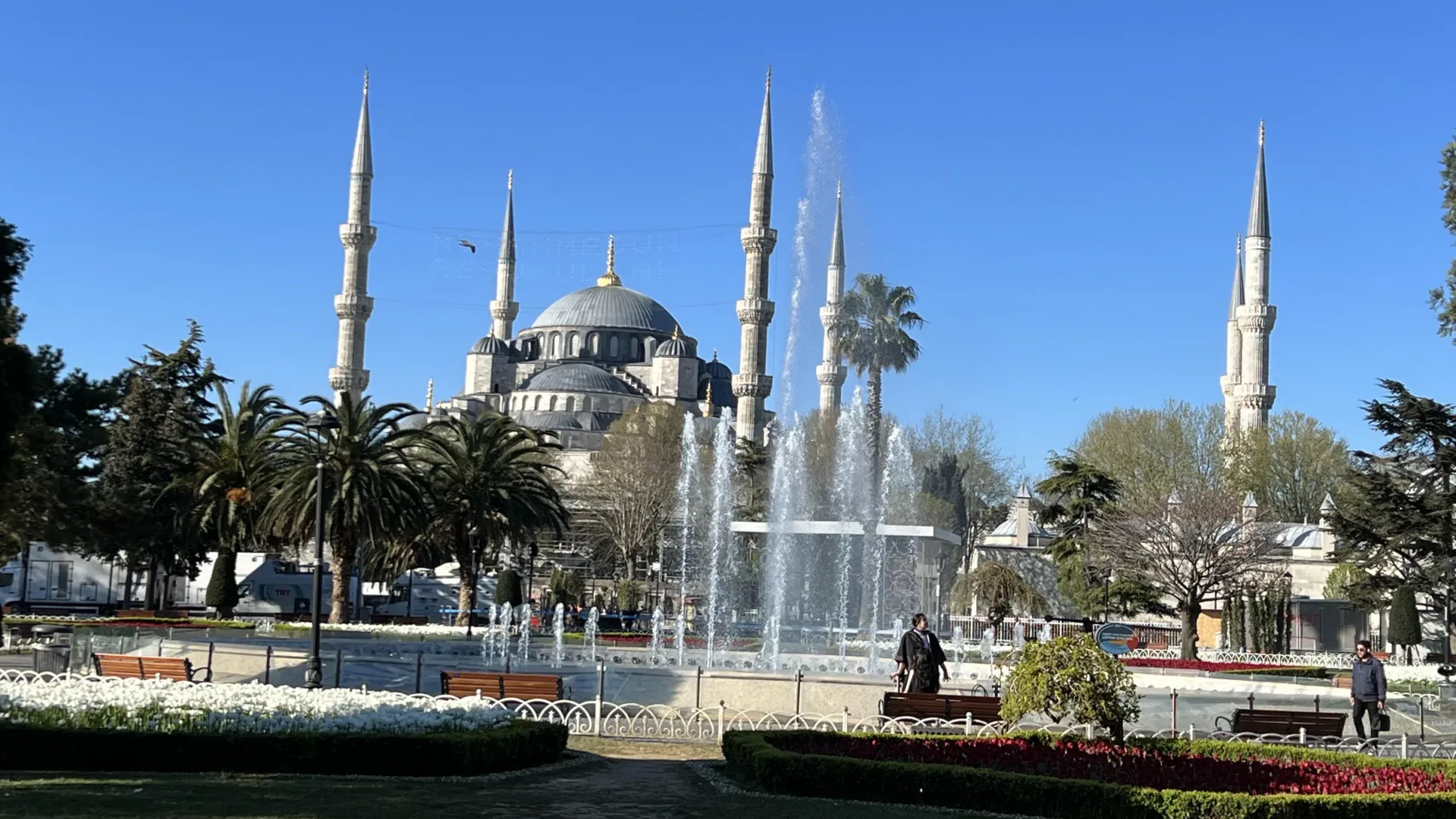 The Blue Mosque and its minarets seen across the fountain and gardens of Sultanahmet