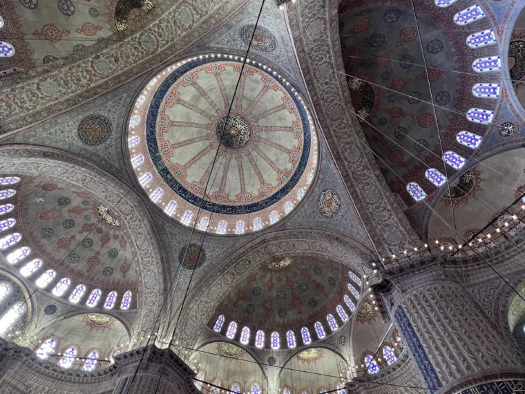 The dome of the Blue Mosque and its ring of windows, from the floor
