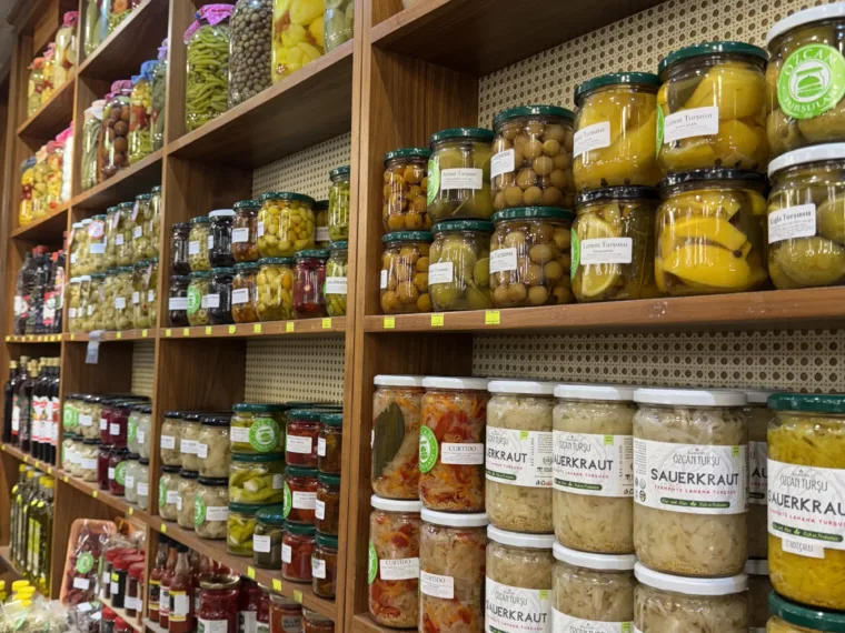 Shelves of pickles and preserves in an Istanbul shop