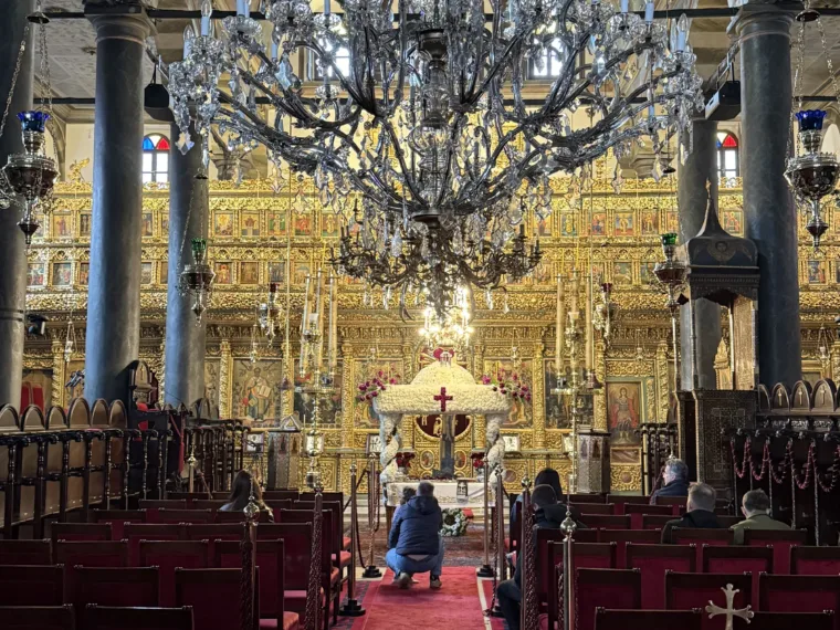 The gilded interior of St George's Church at the Ecumenical Patriarchate in Fener, with its chandelier above the nave