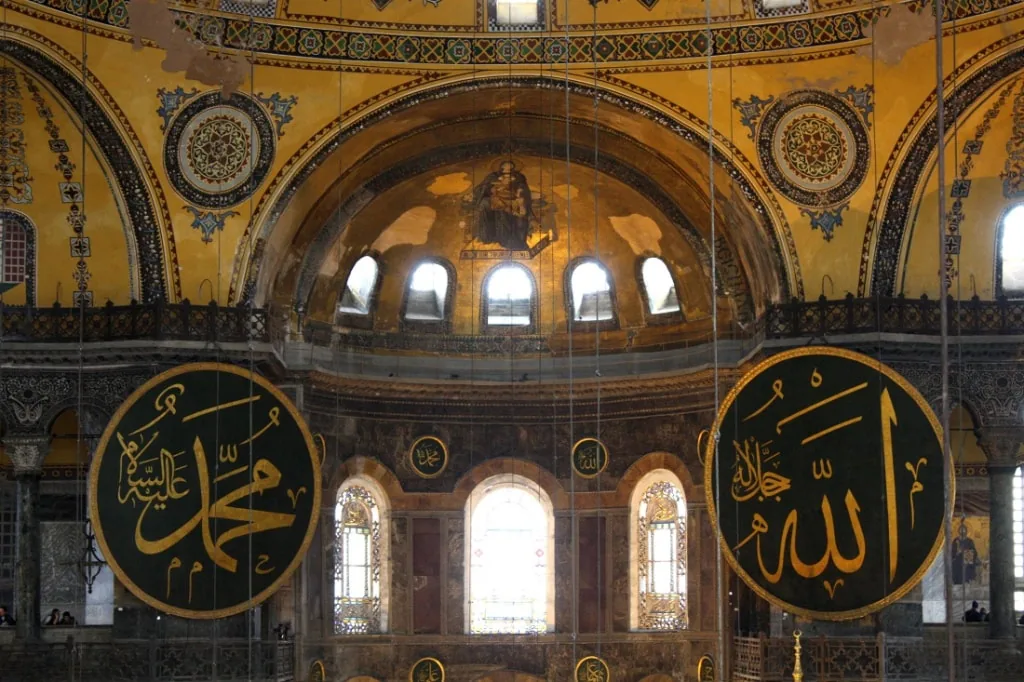 Gold mosaics and calligraphy roundels in the gallery of Hagia Sophia