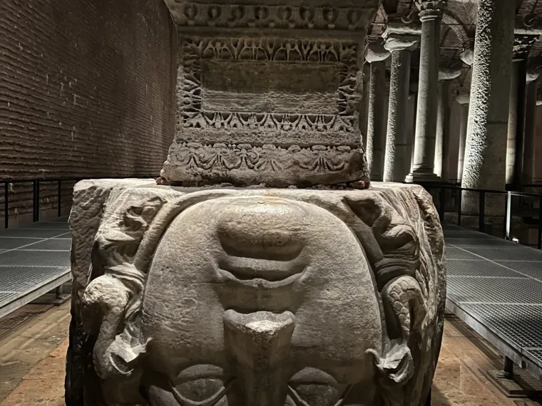 The upturned Medusa head at the base of a column in the Basilica Cistern