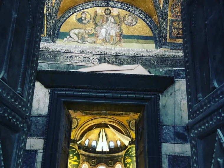 The Christ mosaic above the Imperial Door of Hagia Sophia, looking through to the golden apse