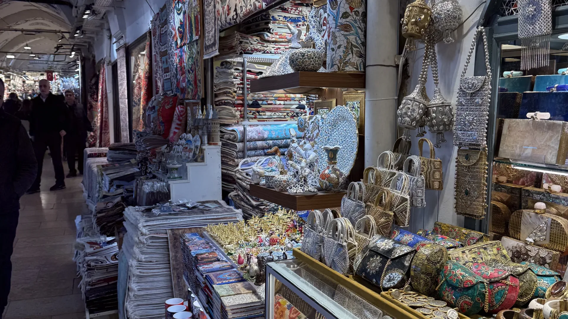 Lamps, textiles and ceramics filling a lane of the Grand Bazaar