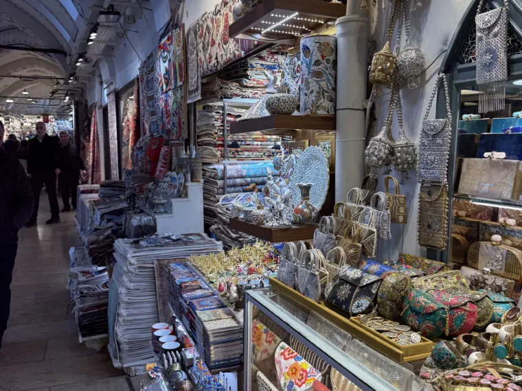 Lamps, textiles and ceramics filling a lane of the Grand Bazaar