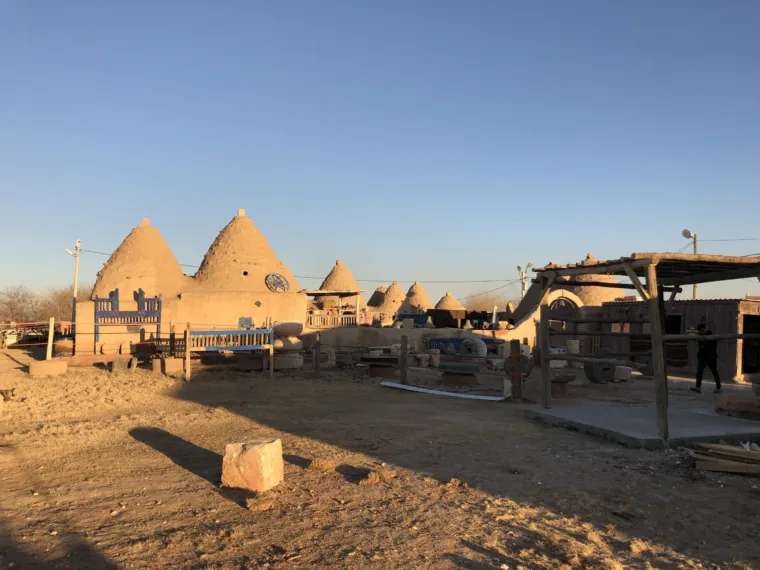 The conical beehive houses of Harran in the late afternoon sun