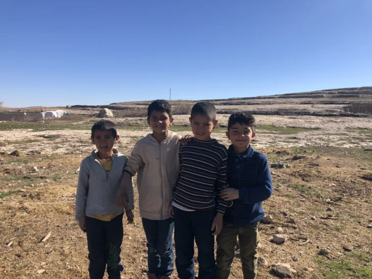 Four boys from the village who stopped to say hello on the Mesopotamia tour