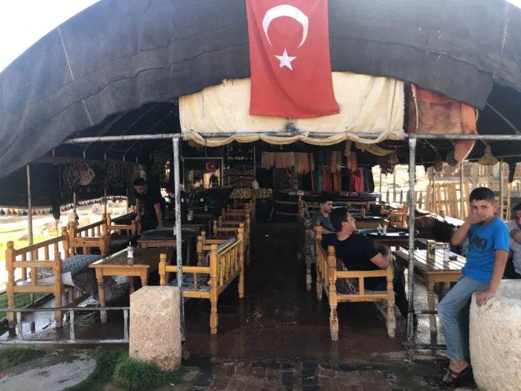 Lunch under an awning with a Turkish flag on the Mesopotamia tour