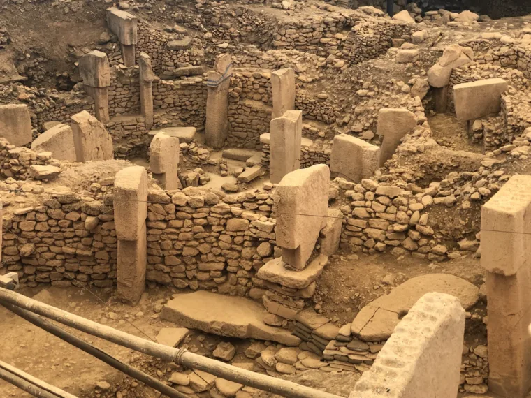 The carved T shaped pillars and dry stone walls of Göbekli Tepe