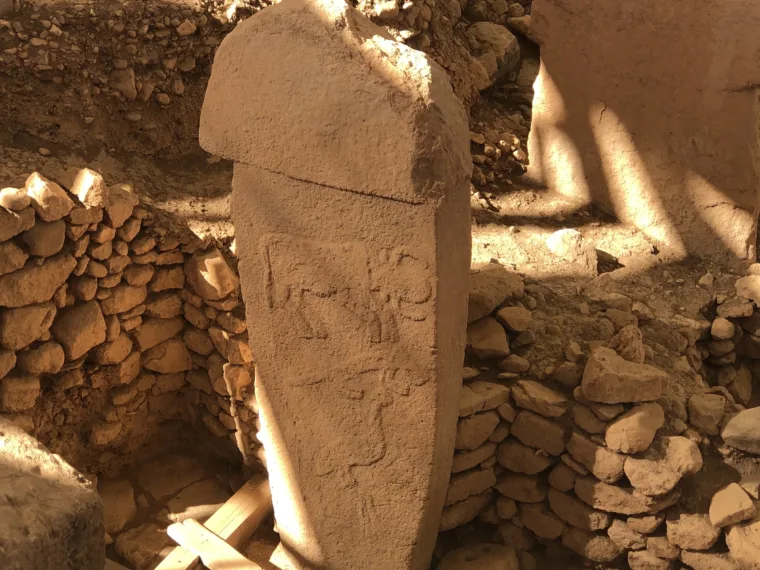 A T shaped pillar at Göbekli Tepe with a relief carved down its side