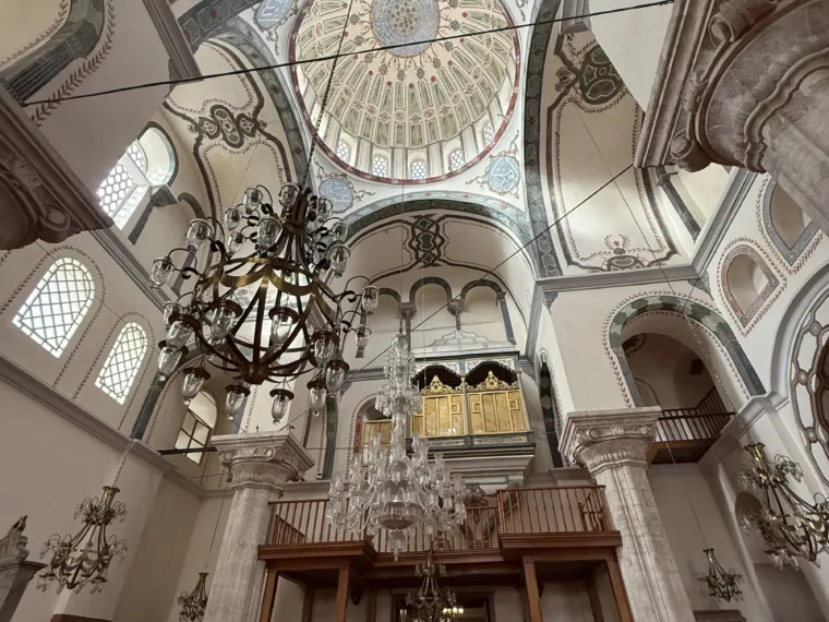 The painted dome and chandelier of a neighbourhood mosque in Istanbul