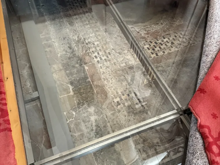Byzantine stonework left exposed under glass in the floor of a mosque in Istanbul