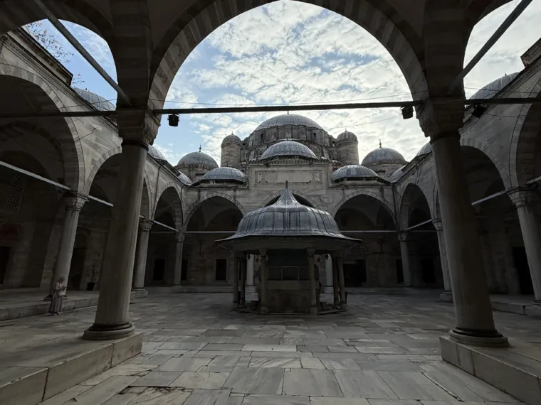 The arcaded courtyard and ablution fountain of an Ottoman mosque in Istanbul