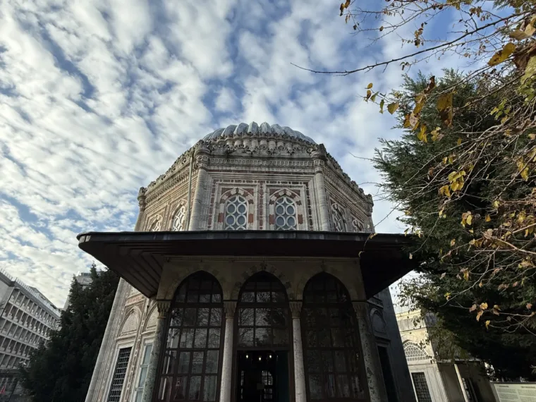 A small Ottoman pavilion in carved stone standing among trees in Istanbul
