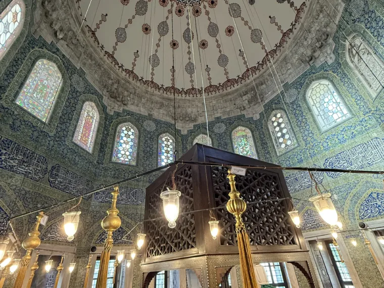Looking up into the painted dome of an Ottoman tomb in Istanbul